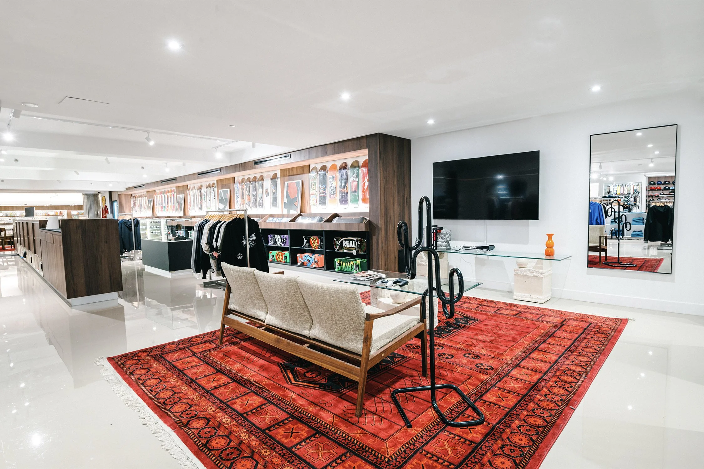 Retail lounge area with seating and merchandising displays designed by Finkel' for Empire