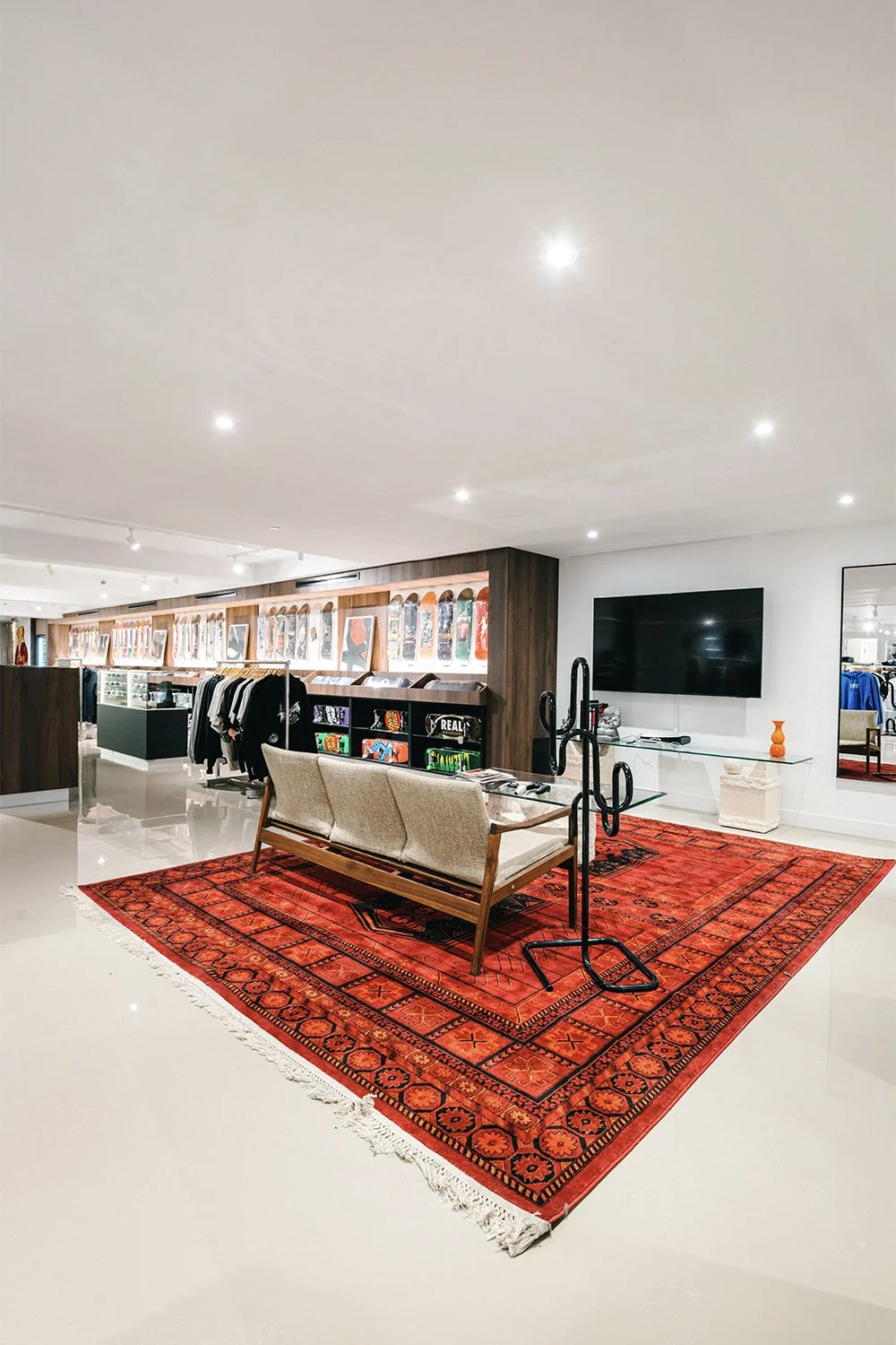 Retail lounge seating within open merchandising layout designed by Finkel' for Empire’s flagship store