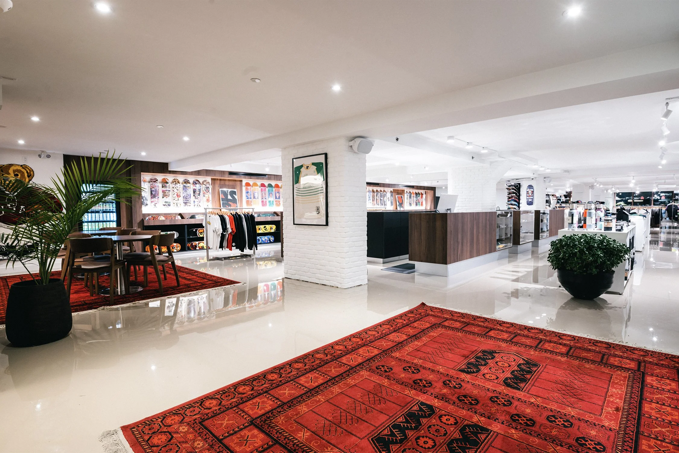 Layered retail interior with lounge seating and merchandising areas designed by Finkel' for Empire’s flagship store