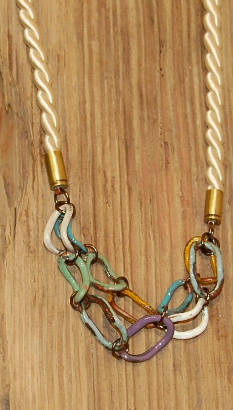 Neutral tones go with everything, and the metal and silk are tough and soft at the same time. Just like mom.