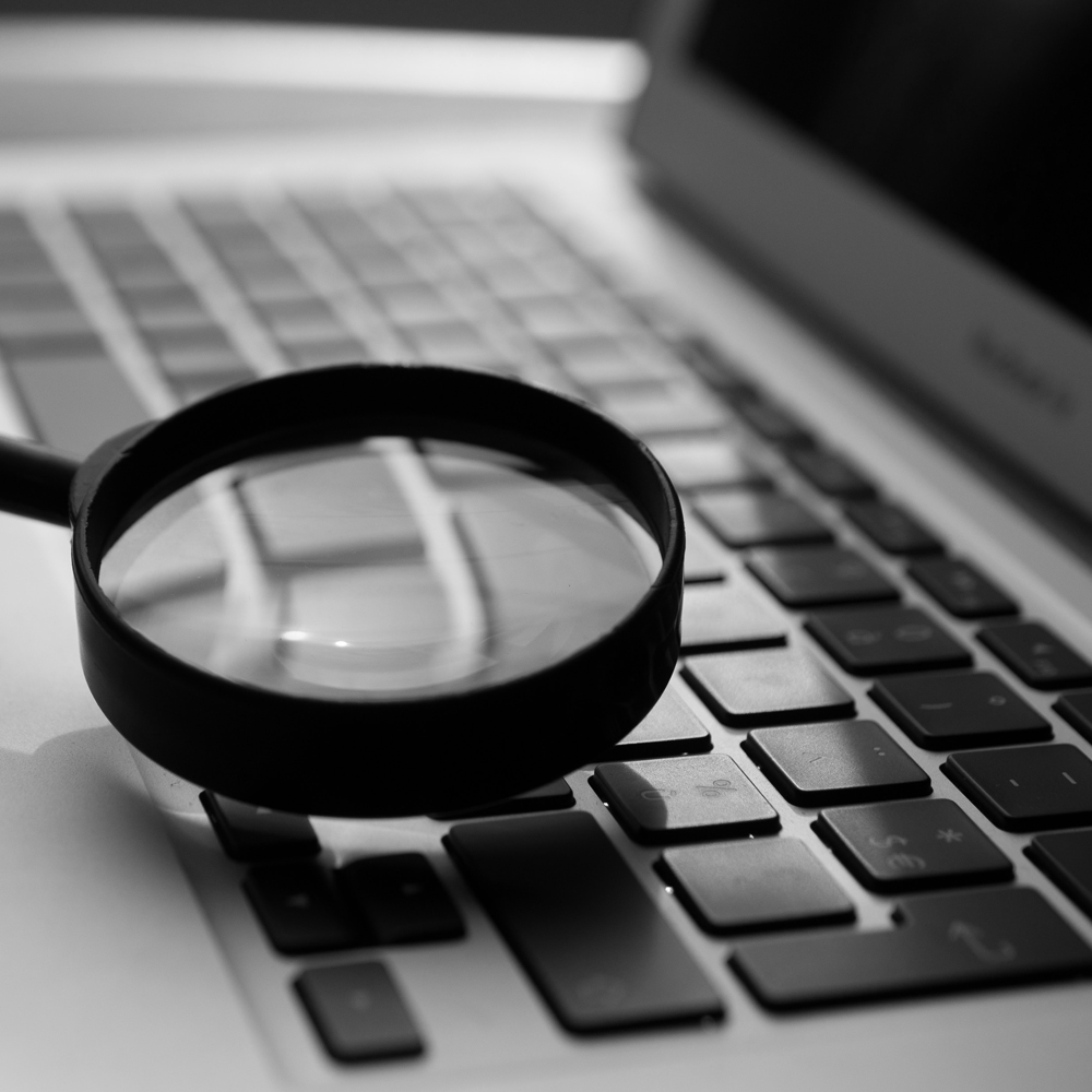 magnifying-glass-and-computer.jpg