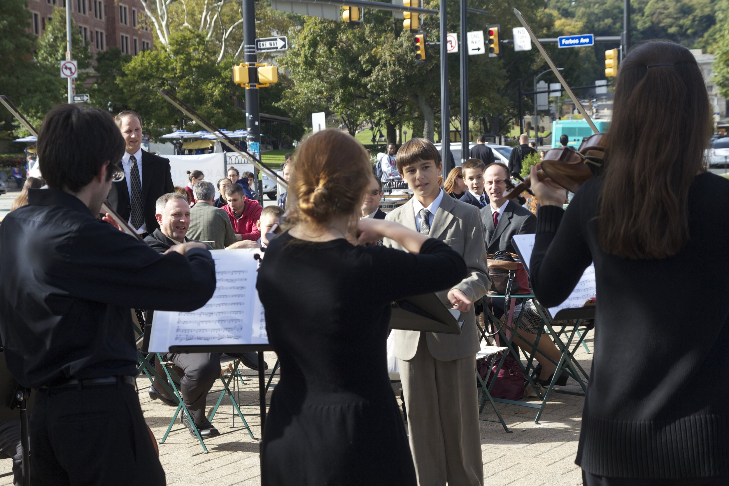 Conduct Us ensemble in Schenley Plaza