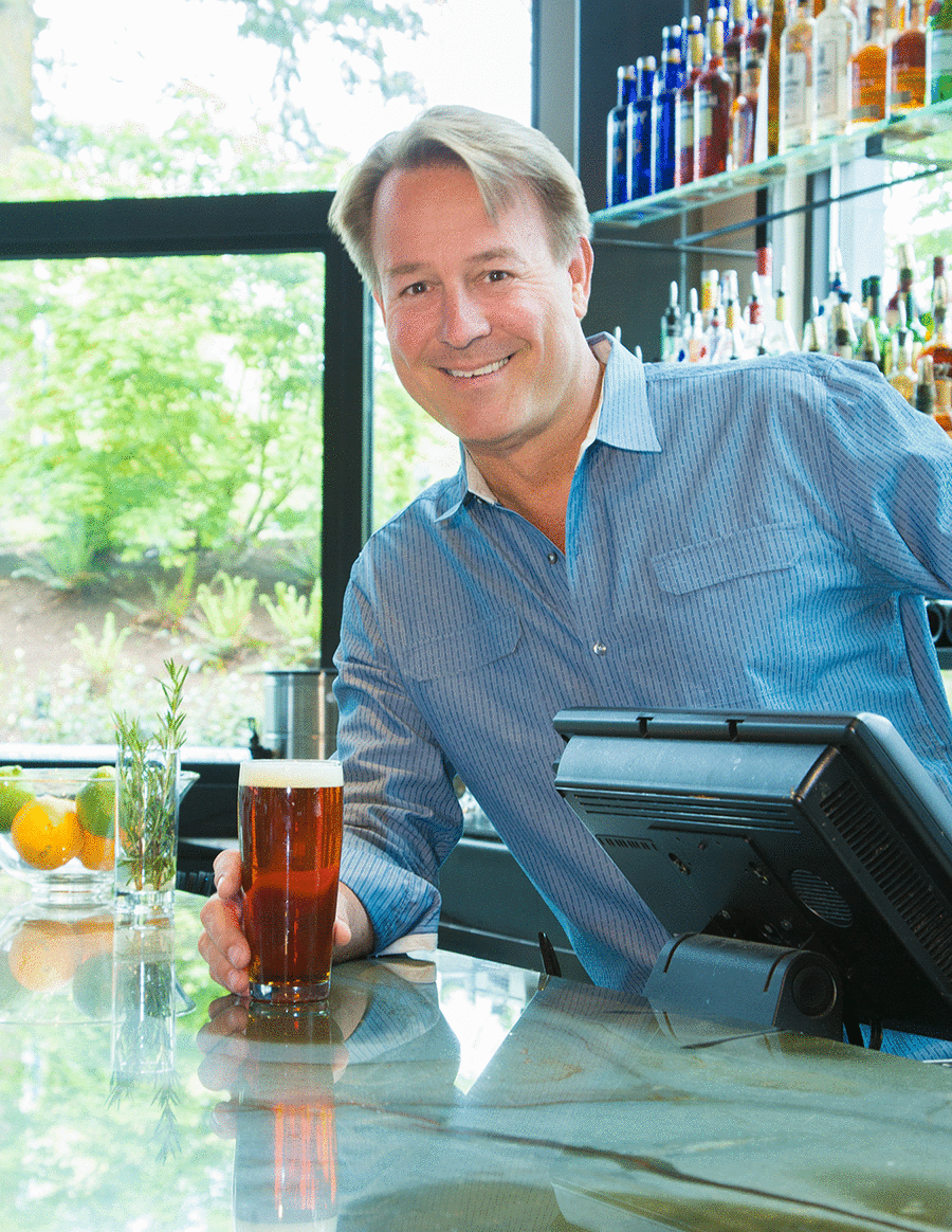 Man in casual blue shirt at restaurant, branding and lifestyle portrait by Studio B Photography Portland