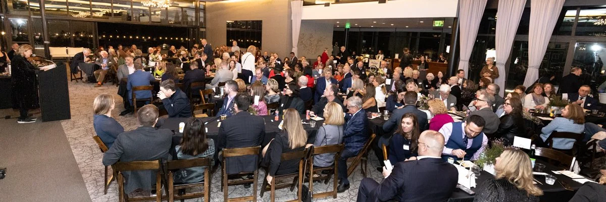 Event photographer capturing candid moments at a Lake Oswego awards ceremony
