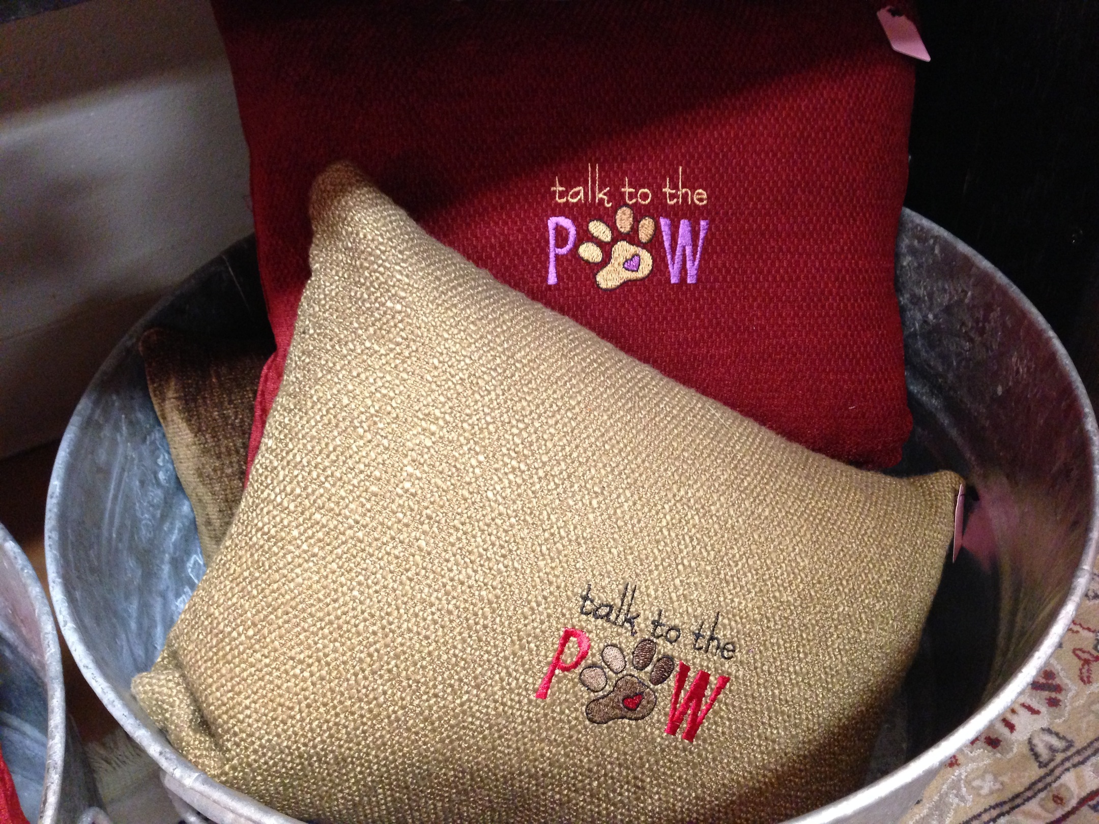 Talk to the Paw embroidered pillows