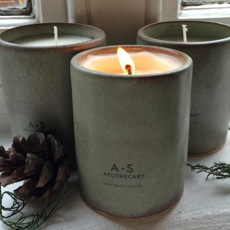 A candle burning to celebrate new beginnings and seasonal endings