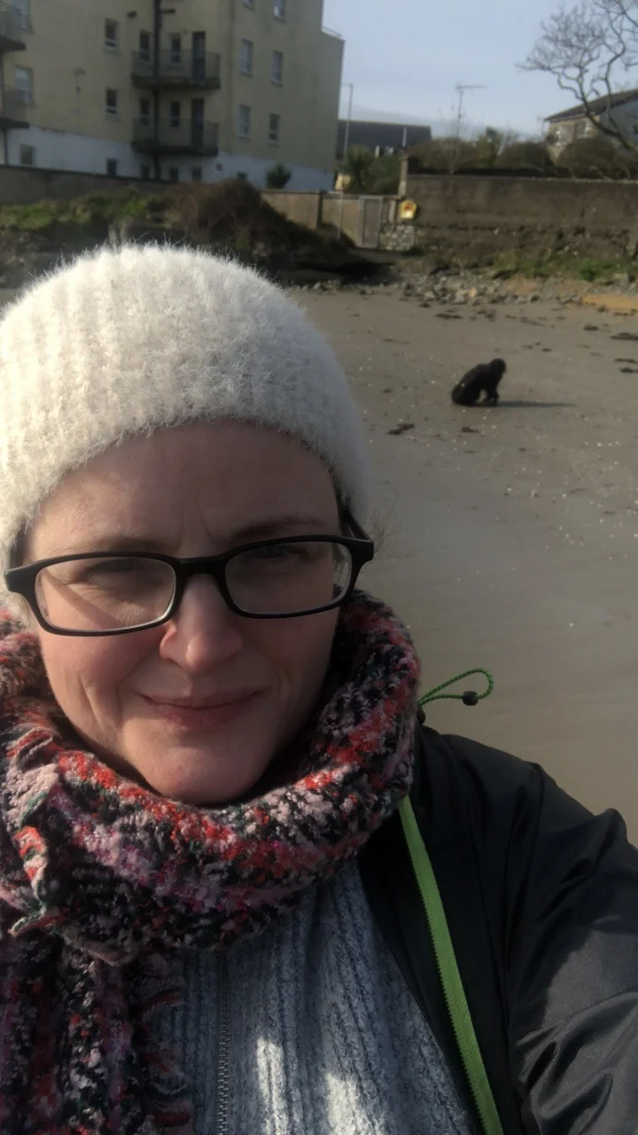 on the beach in between lessons with our pooch Joni Bitchell