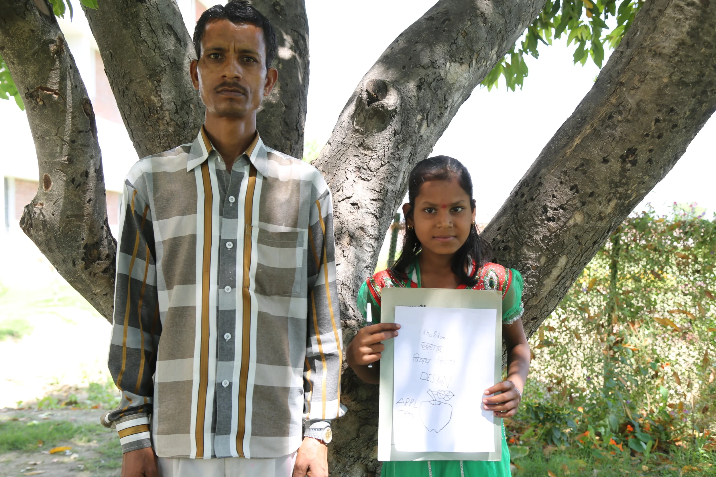 Khushboo likes studying Hindi and wants to be a designer/artist.