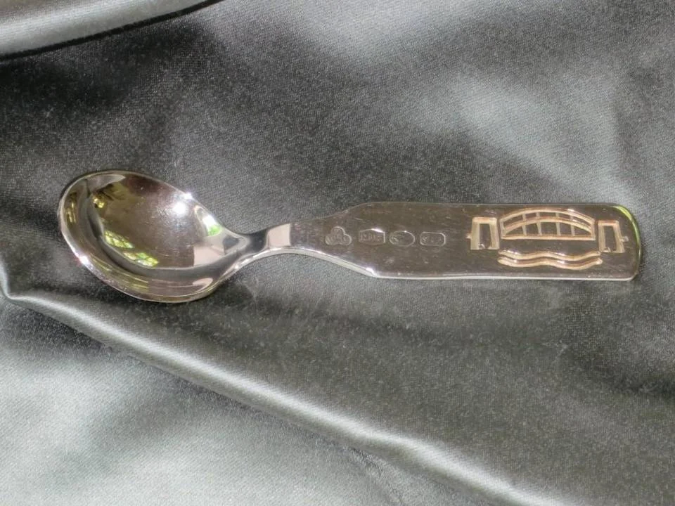 A favorite travel souvenir of Linda Zoffer is a spoon from Australia depicting the Sydney Harbour Bridge.
