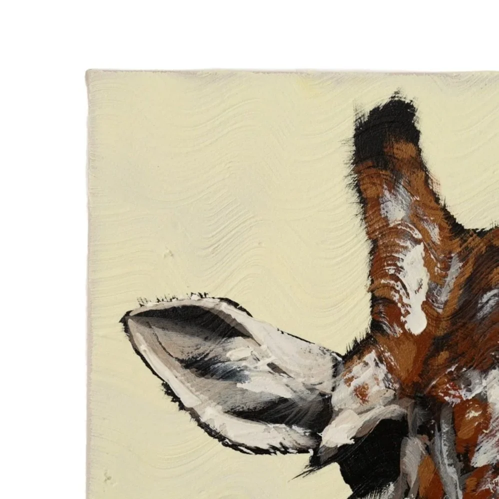 Close-up view of a giraffe’s face painted with bold strokes and softened edges by Josh Brown.
