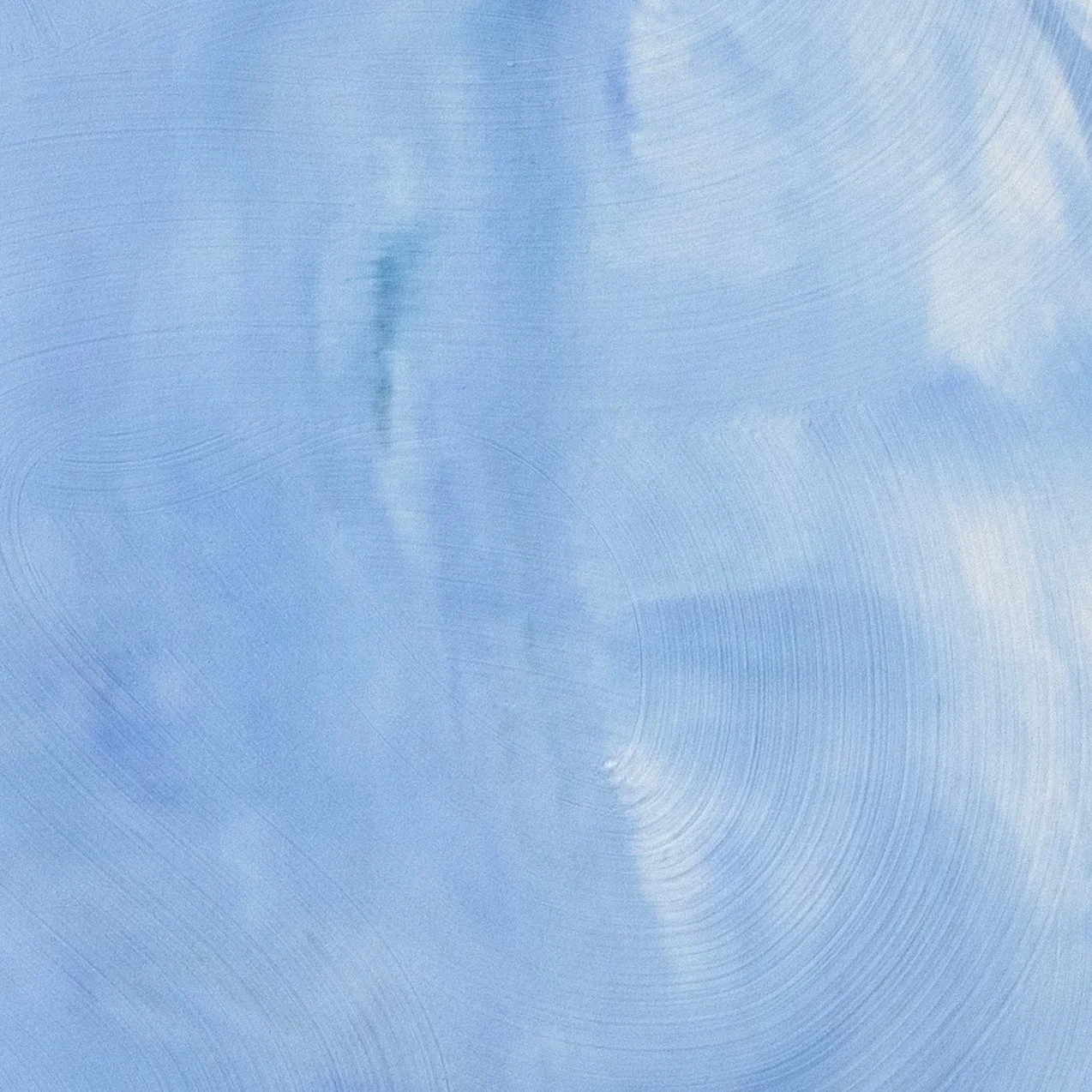 Modern coastal art featuring stylized clownfish floating in a light blue environment cropped to show the beautiful blue background by New York City based painter Josh Brown.
