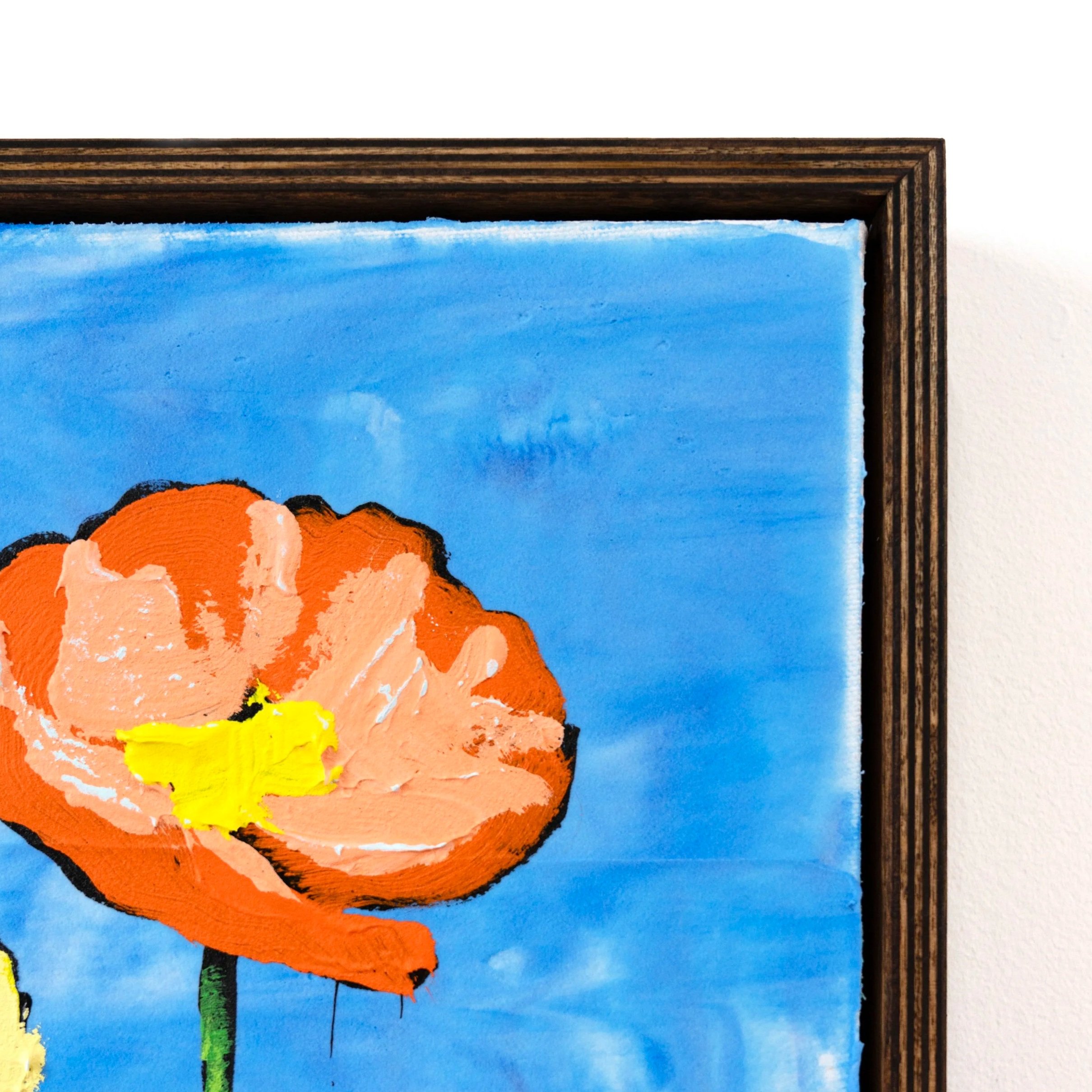 A cropped image of a vibrant painting of colorful flowers against a blue background with simple green stems and thick layers of paint by New York City based painter Josh Brown.