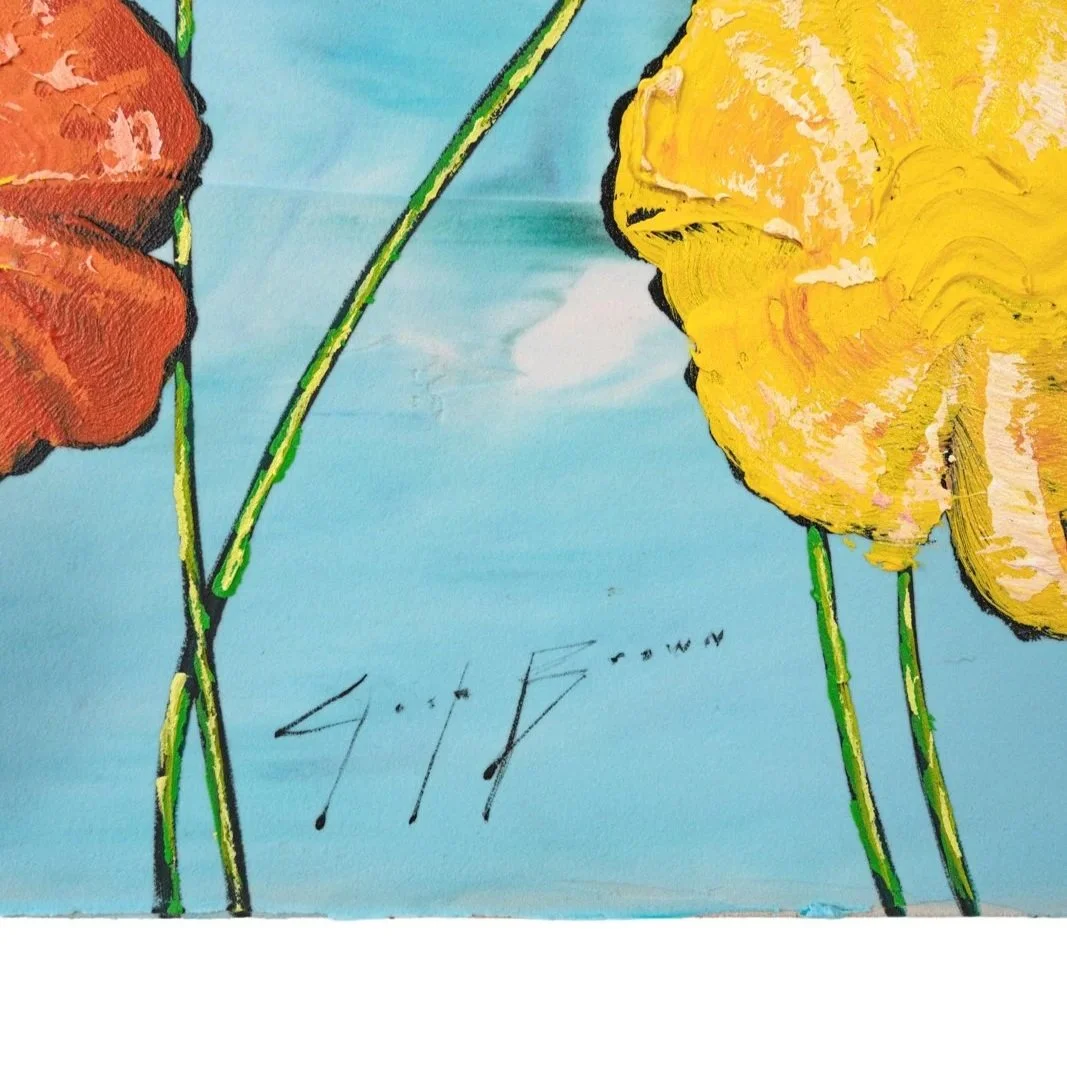 Contemporary floral artwork featuring red, yellow, orange, and pink blooms against blue cropped to show the artist's signature and flowers by Josh Brown.
