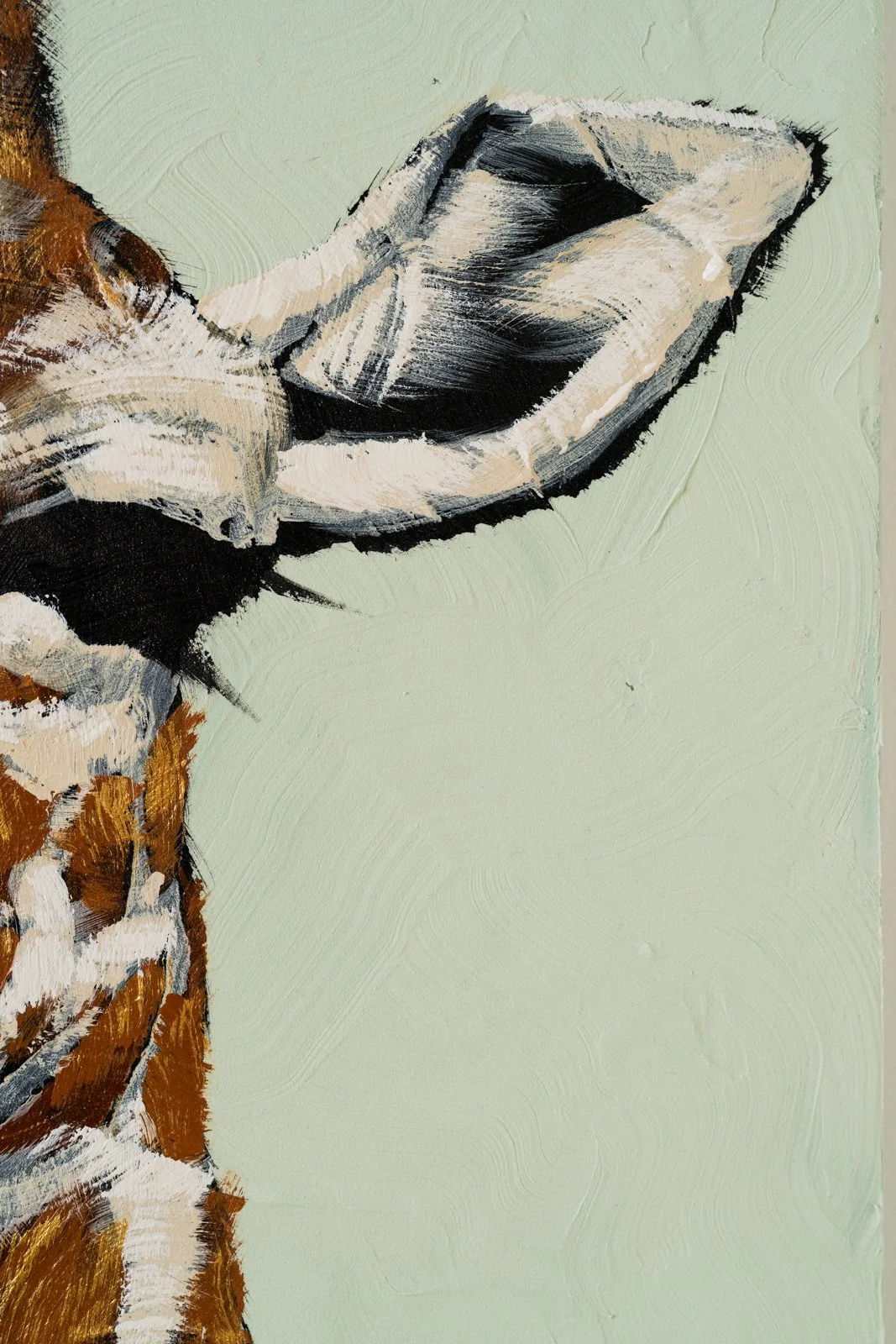 Contemporary animal painting showcasing a giraffe on a pale green minimalist backdrop by Josh Brown.