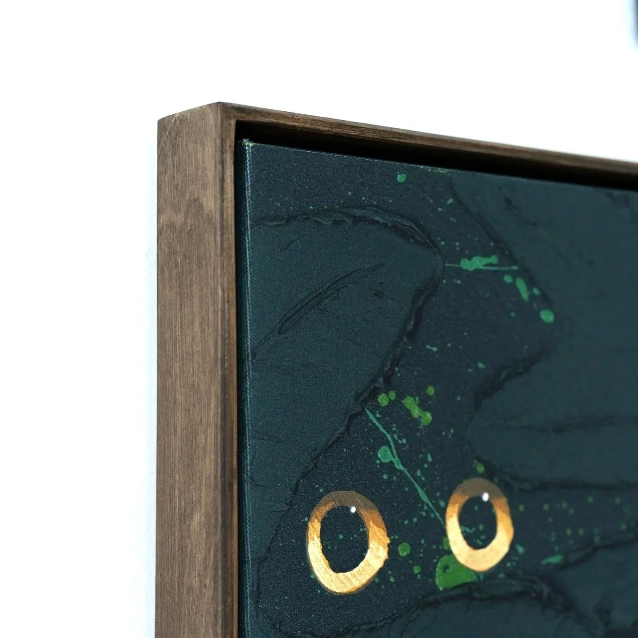Many-Eyes-on-Dark-Green_22x22_Framed-Print-6.jpg
