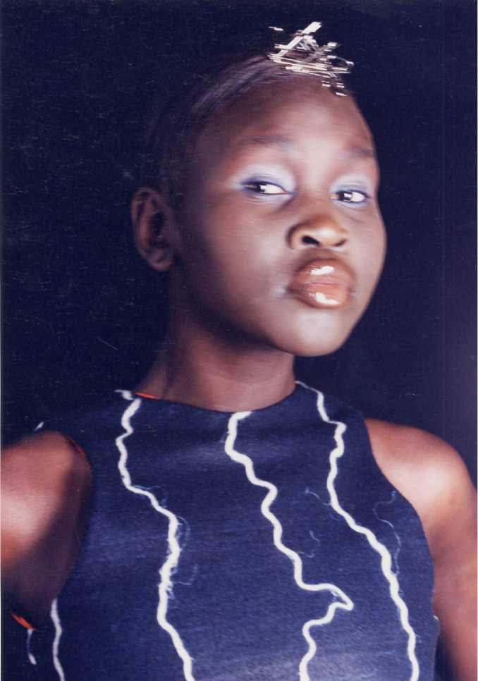 Alek Wek in String Print (1994), photo by Gavin Fernandez