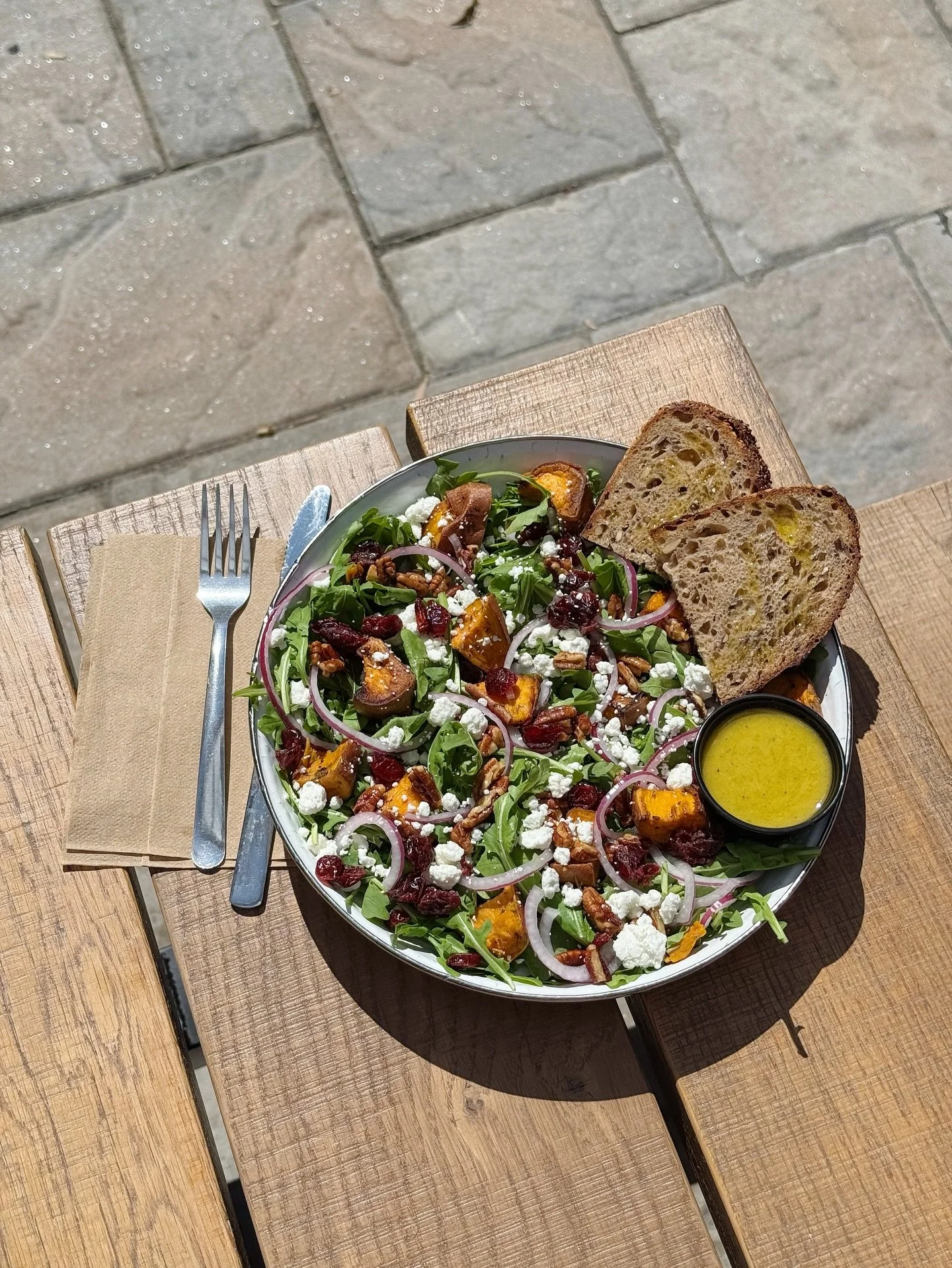 The seasonal harvest salad has been hitting the spot lately! Arugula, roasted sweet potatoes, candied pecans, onions, cranberries, goat cheese, orange thyme vinaigrette, &amp; @boultedbread 😋