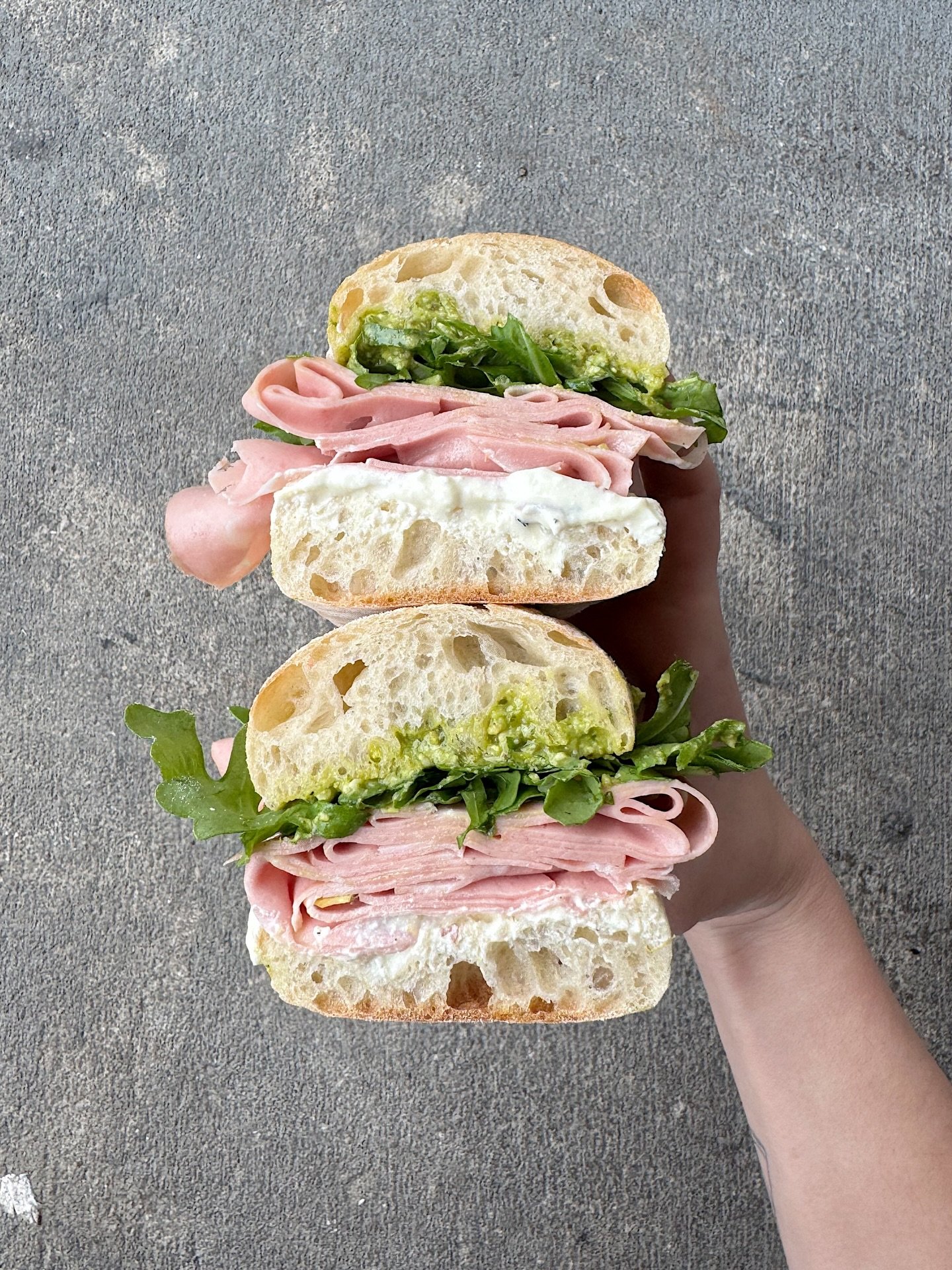 Mortadella sammie for our winter seasonal sandwich special 🤩 Mortadella, lemon ricotta, pistachio pesto, arugula, olive oil, maldon salt &amp; cracked pepp. Get in on this y&rsquo;all!!!!! Served at 11am daily.