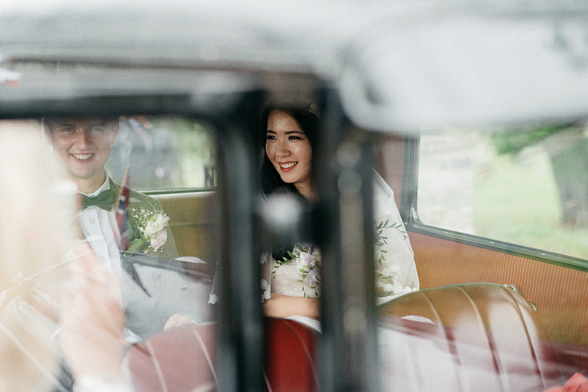 Wedding couple in their ride