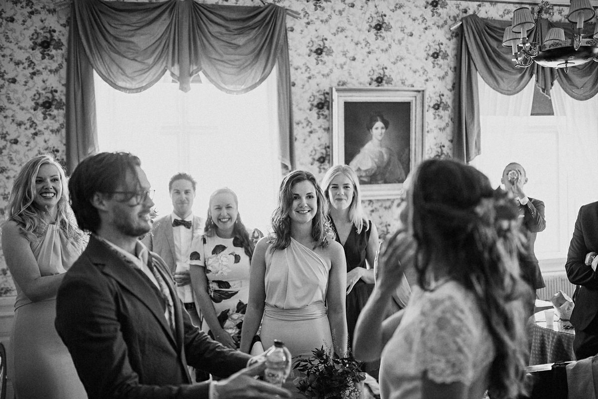Friends sees the wedding couple