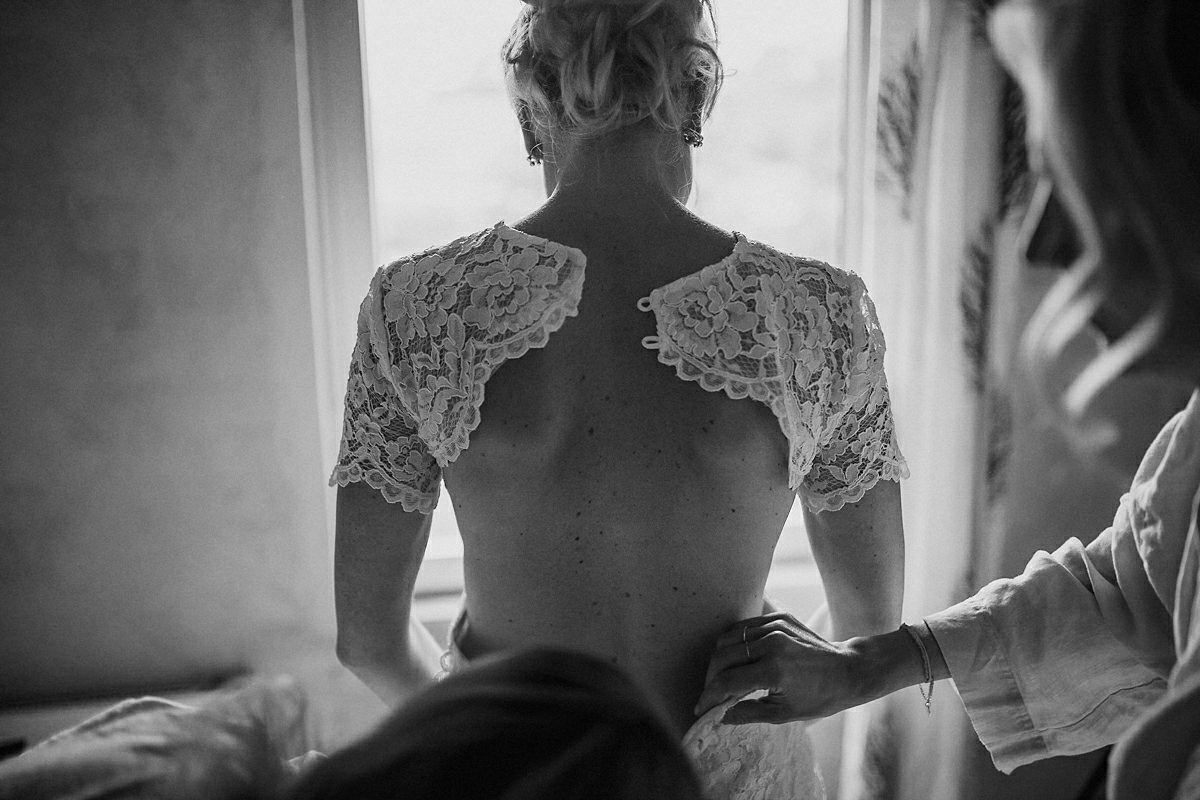 Getting in the dress at Marten Pers Kalla, Osterlen