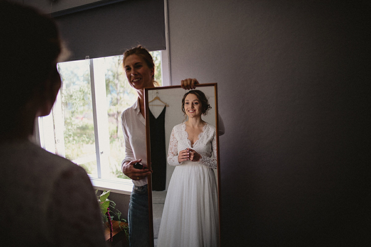 Bride looking in the mirror