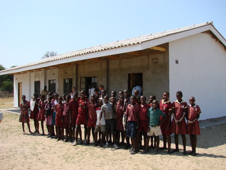   Students in front of their new building at Ziga Junior School before completion.  