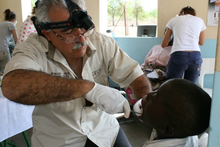   Paco works on a youngster at SIdenda Clinic.  