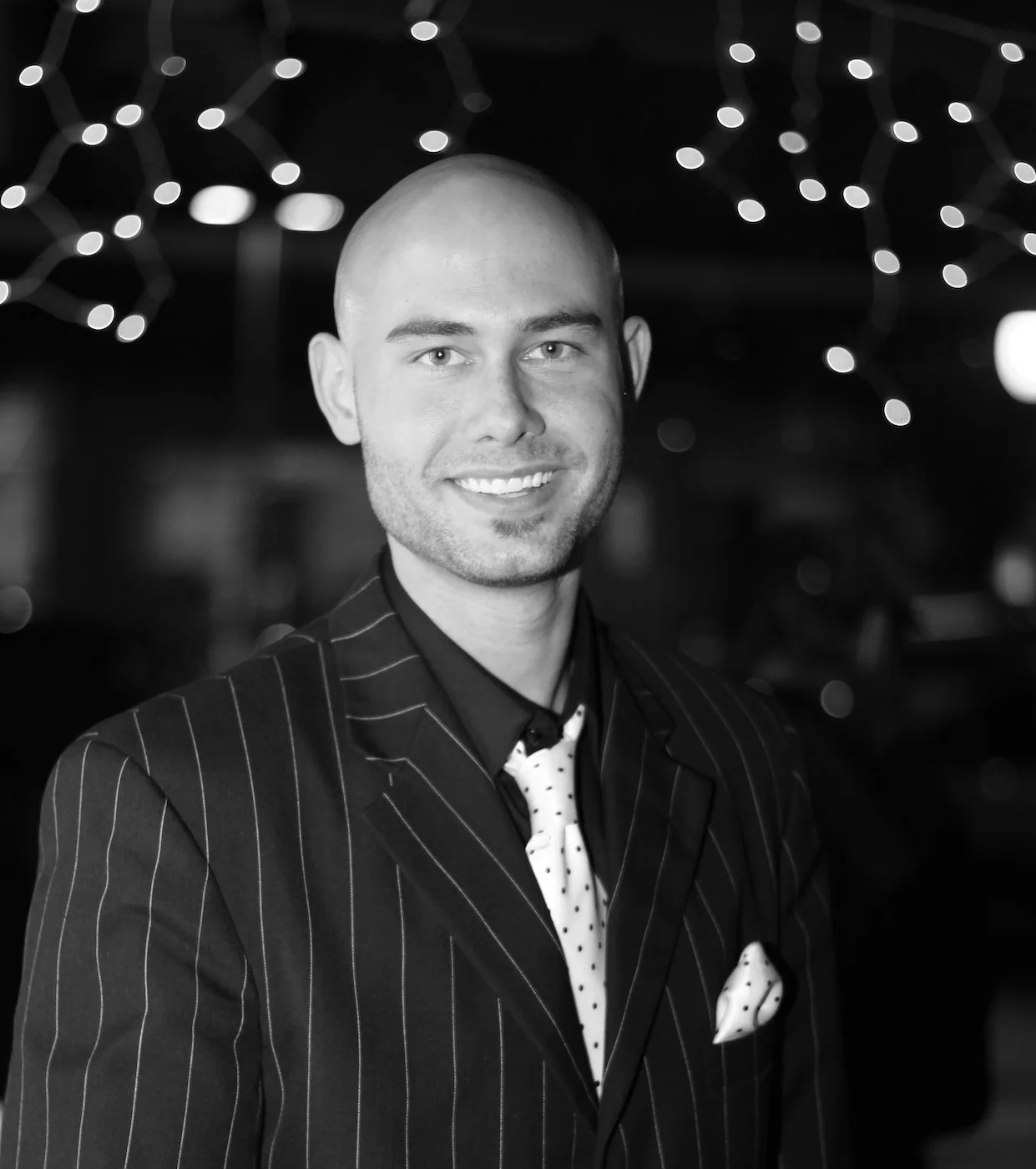 Cam Headshot (pinstripes).jpg