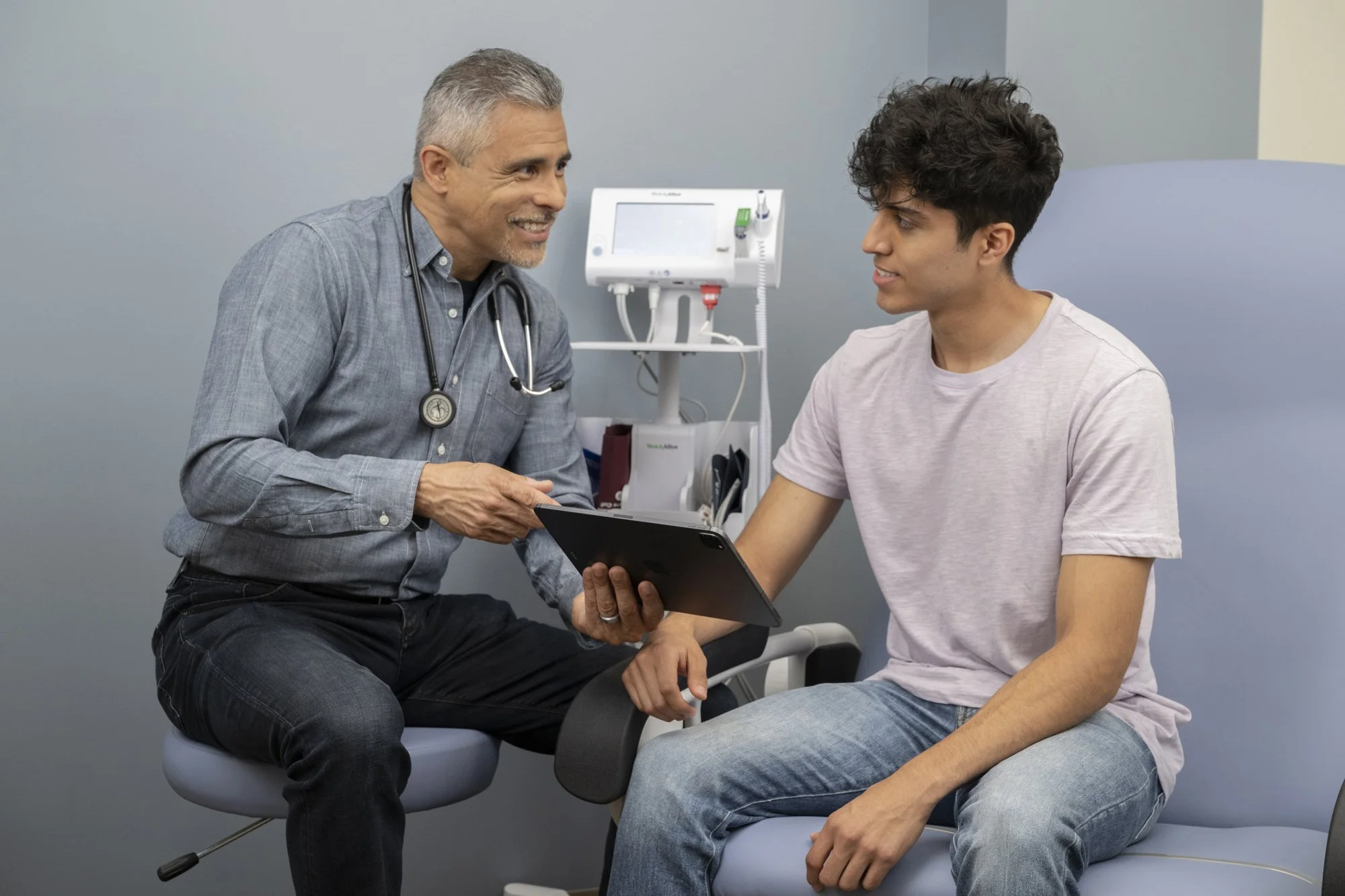Medical staff checking patient vitals.jpg