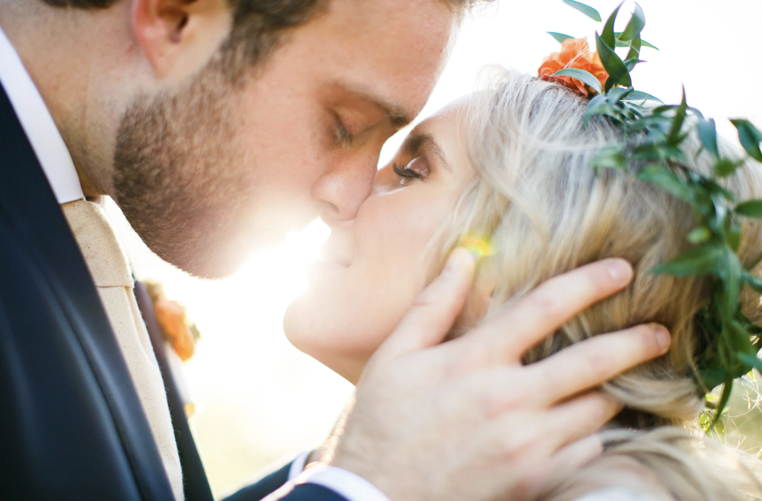 newly wed couple kissing