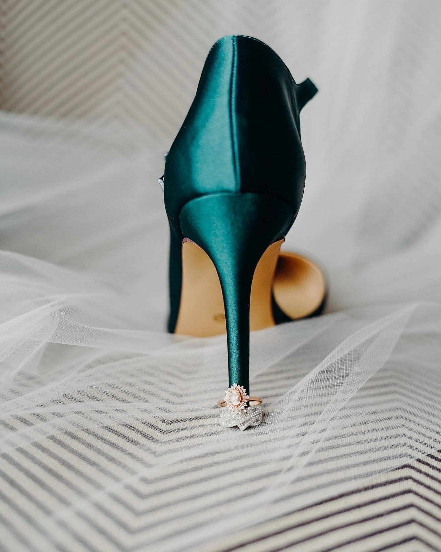 Who says you can&rsquo;t add a little color into your wedding shoes? Love these emerald pumps!