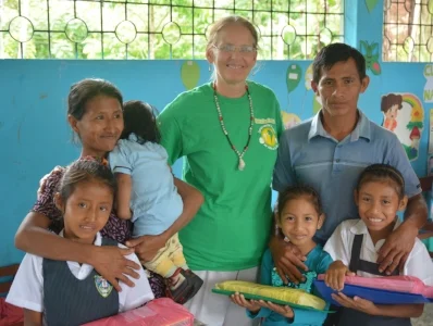  Pam Bucur and an Adopt-A-School family