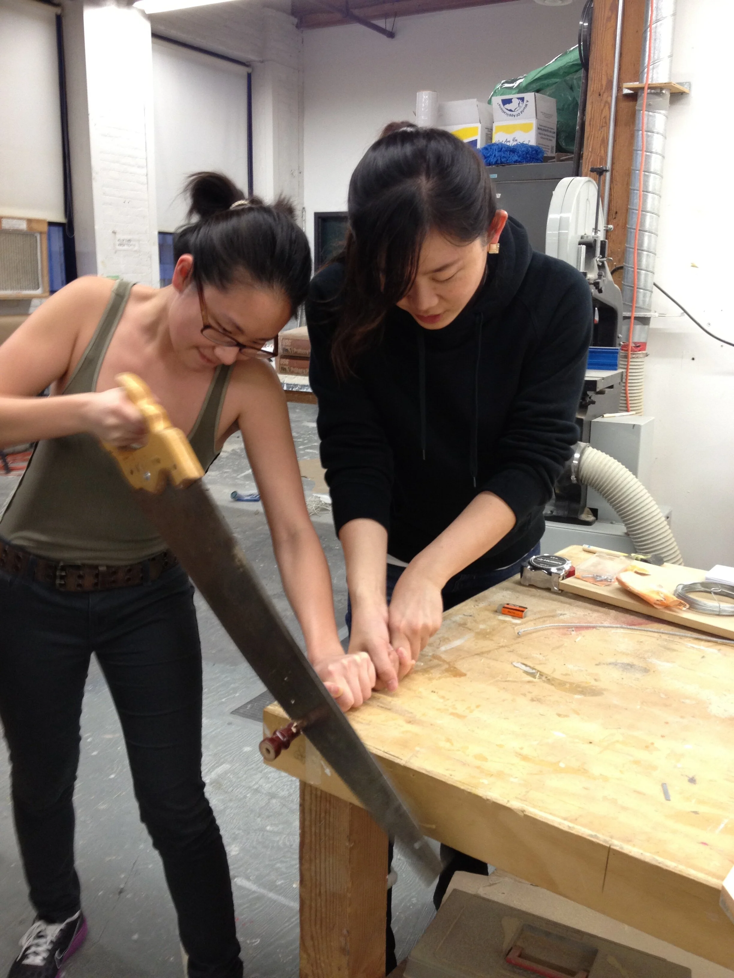 Cutting materials in woodwork shop