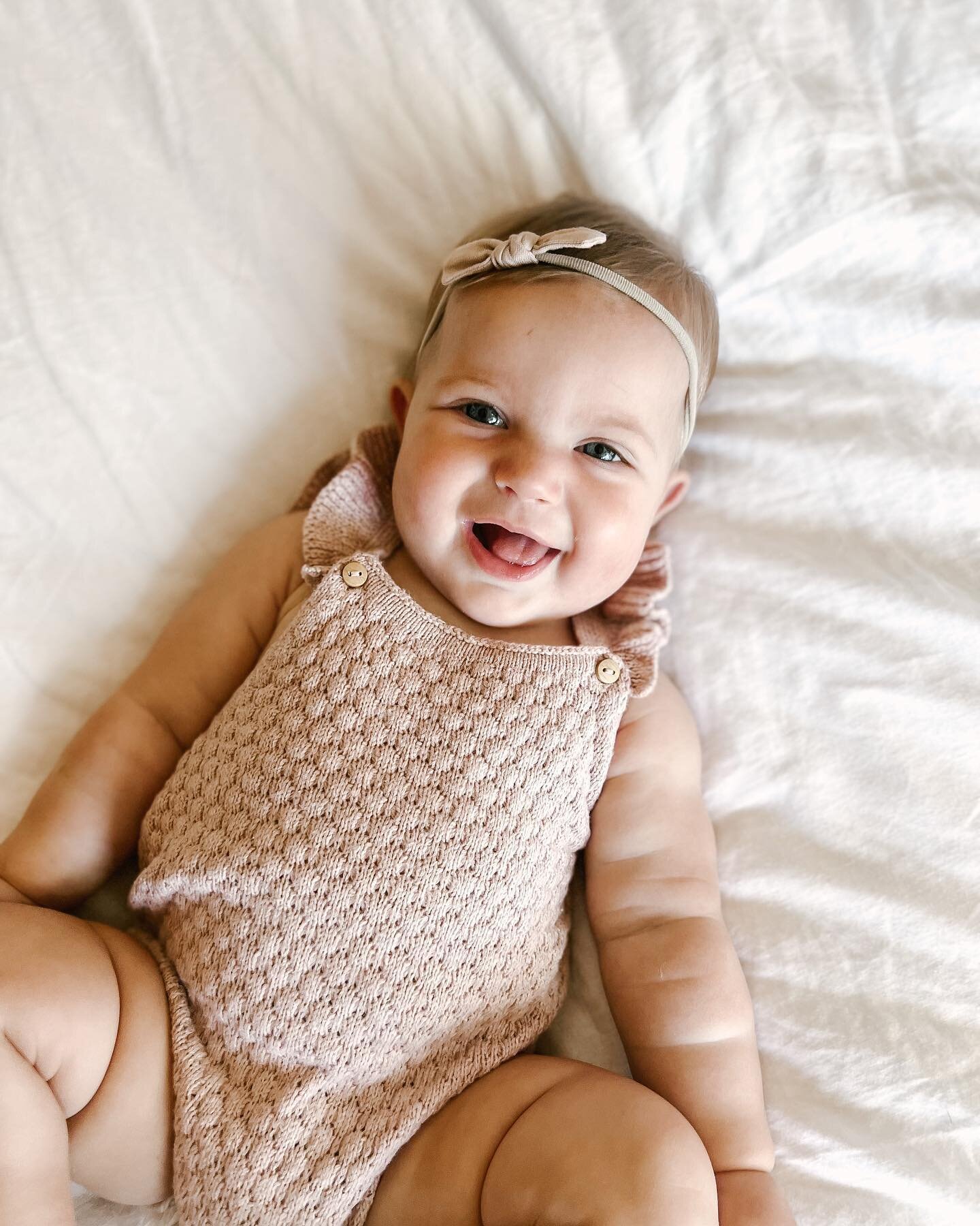 S I X  M O N T H S ! My favorite age so far. This girl is high energy- she dances to music, rolls long distances, kicks like a maniac when she is excited, reaches for and rips off all the leaves on branches within reach of her stroller, and talks non