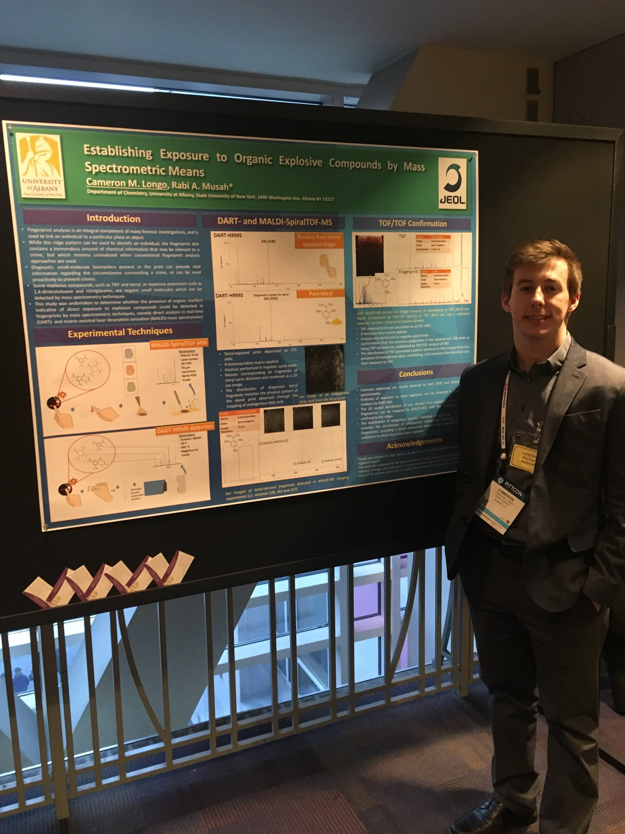 Cameron presenting his poster.