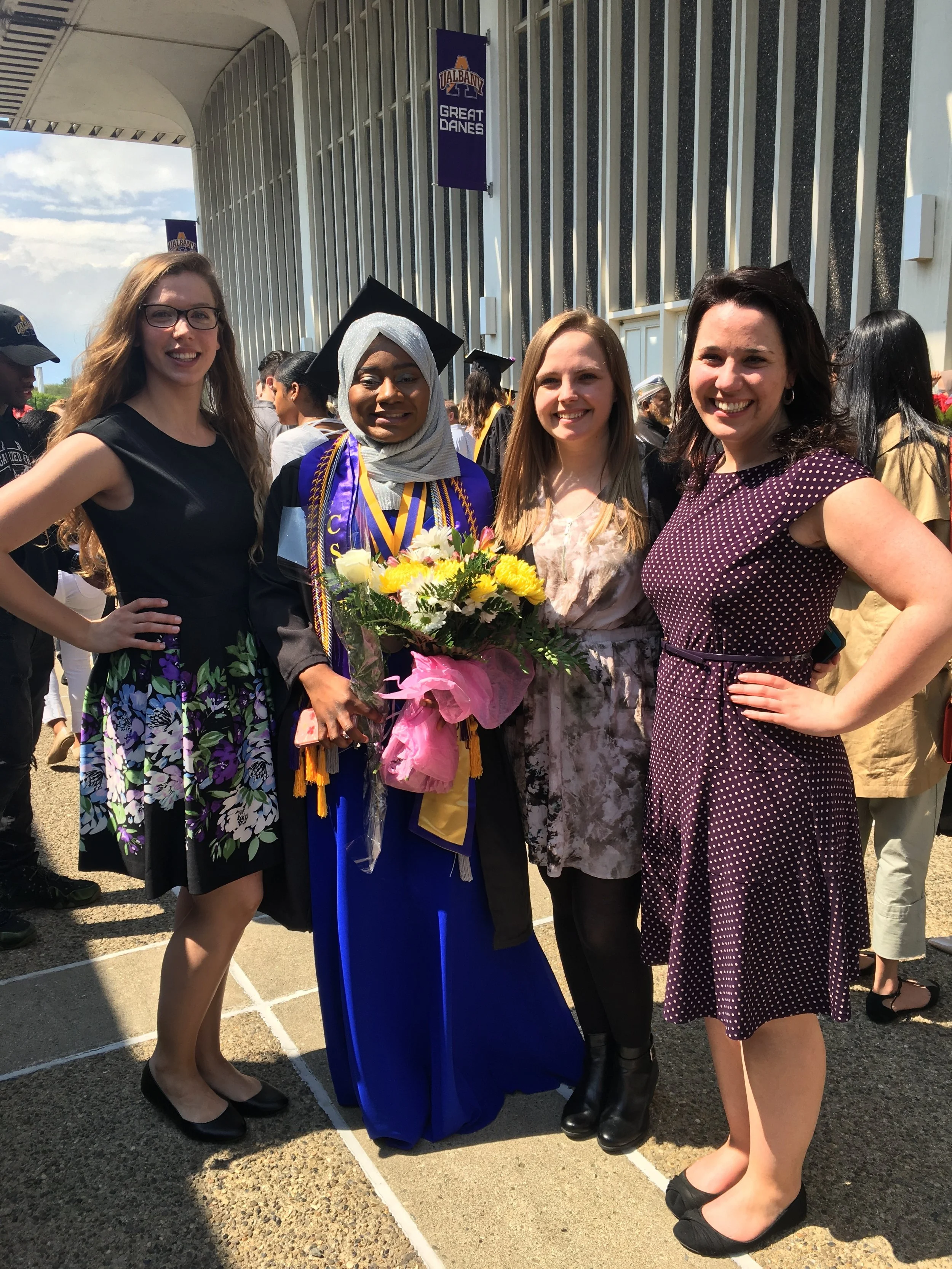 Kristen, Meghan and Allix celebrating with Nana-Hawwa.