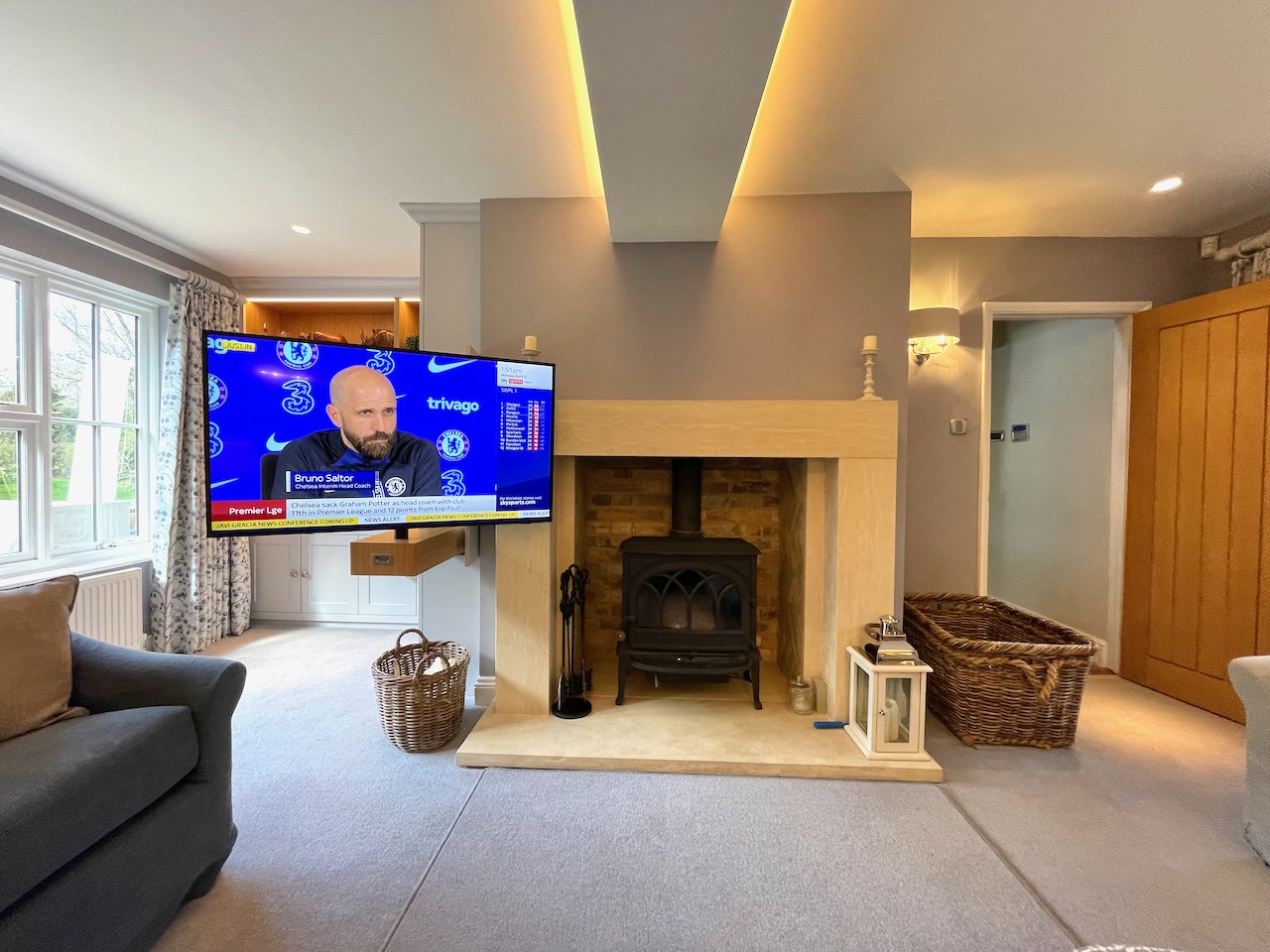 Fireplace with pull-out TV cabinetry