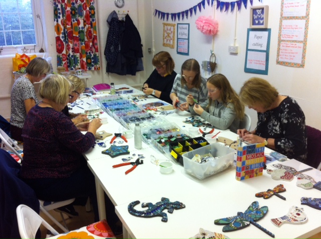 Mosaic making in action. There are so many lovely tiles to choose from!