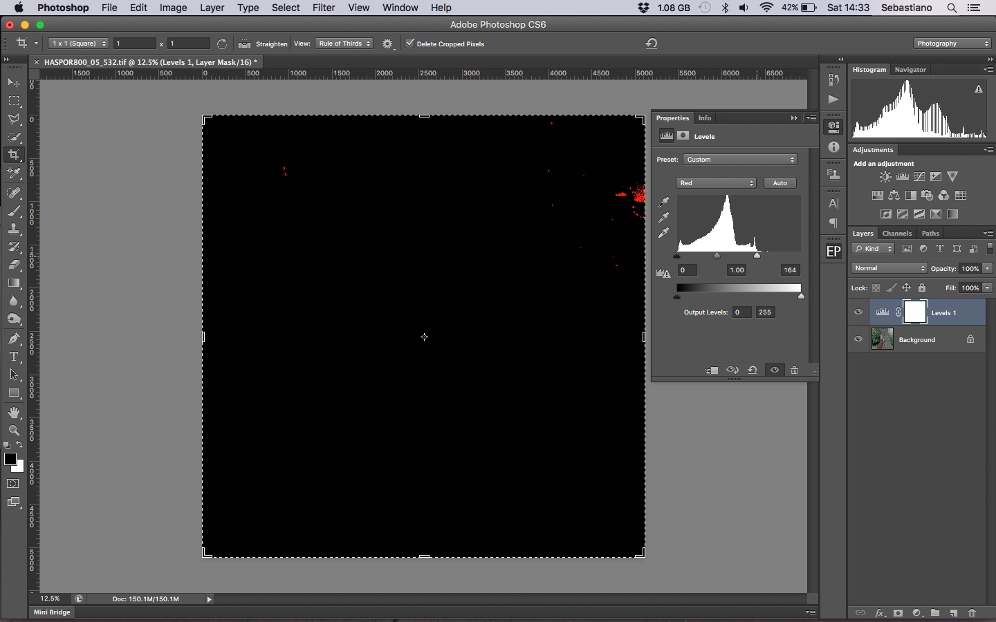To help find the edge of the histogram hold the alt key until red clipping is seen.