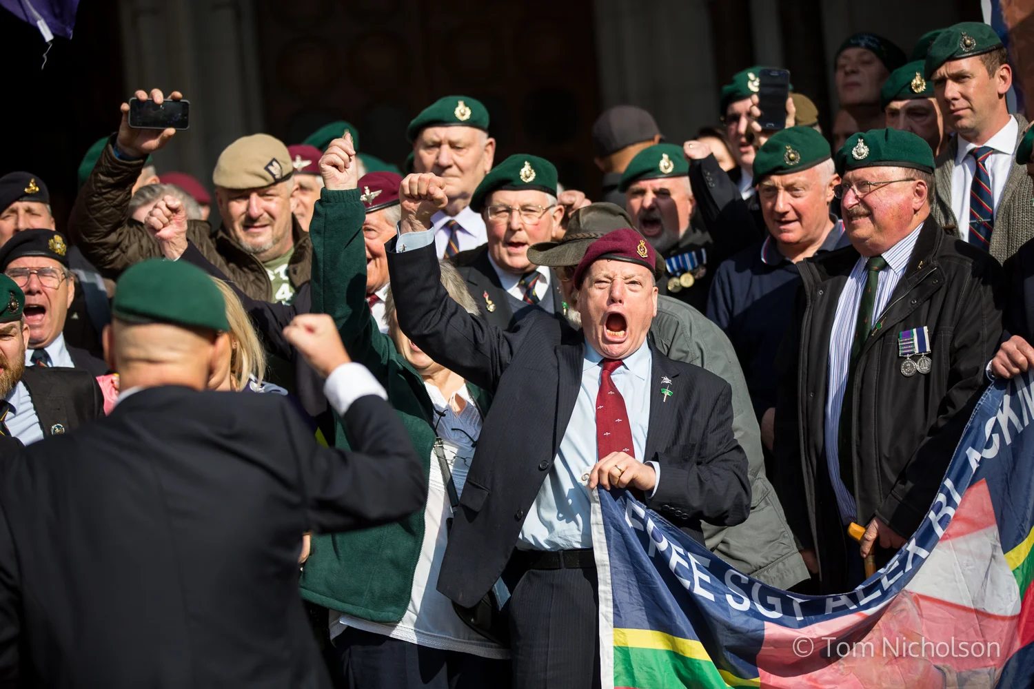 ©2017 Tom Nicholson. 28/03/2017. London, UK. Supporters of Sergeant Alexander Blackman celebrate outside the Royal Courts of Justice in London after his appeal trial was successful and he will be released from prison.