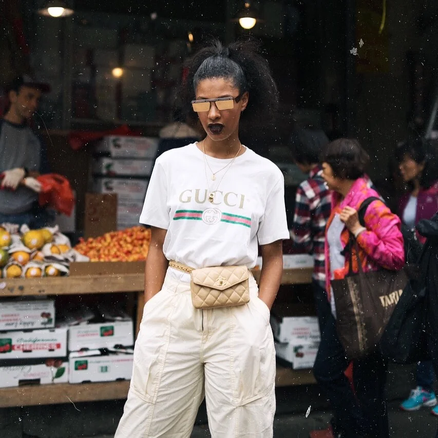 Claire+Leana+Millar+in+chinatown+wearing+a+Gucci+logo+tee,+tan+Chanel+fannypack,Chanel+slingback+pumps,+Urban+Outfitter+parachute+pants,+++Adam+Selman+for+Le+Specs+The+Flex+glasses.jpg