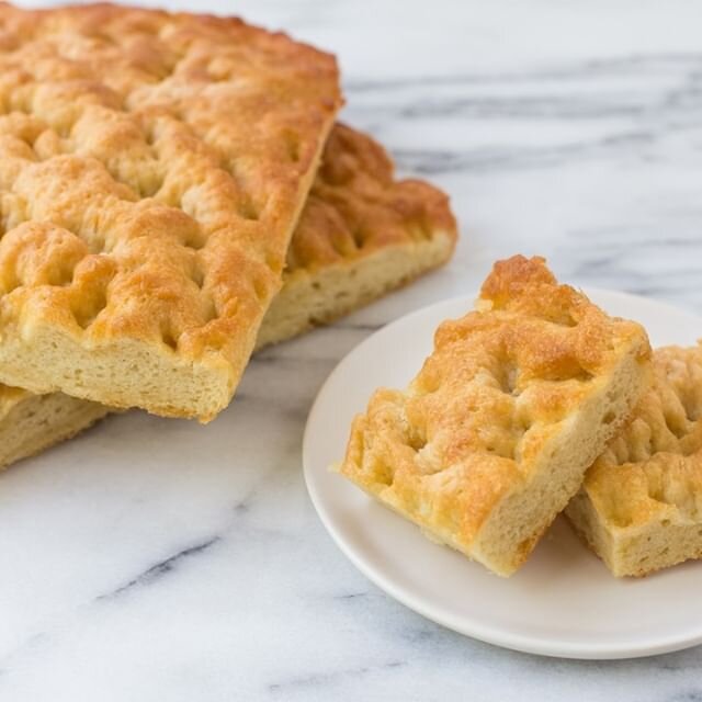 Our signature (dairy-free) focaccia bread is one of our most loved items. It's soft, moist, and truly delicious. Go to our website to order one today and even have it shipped to your house! Link in bio.