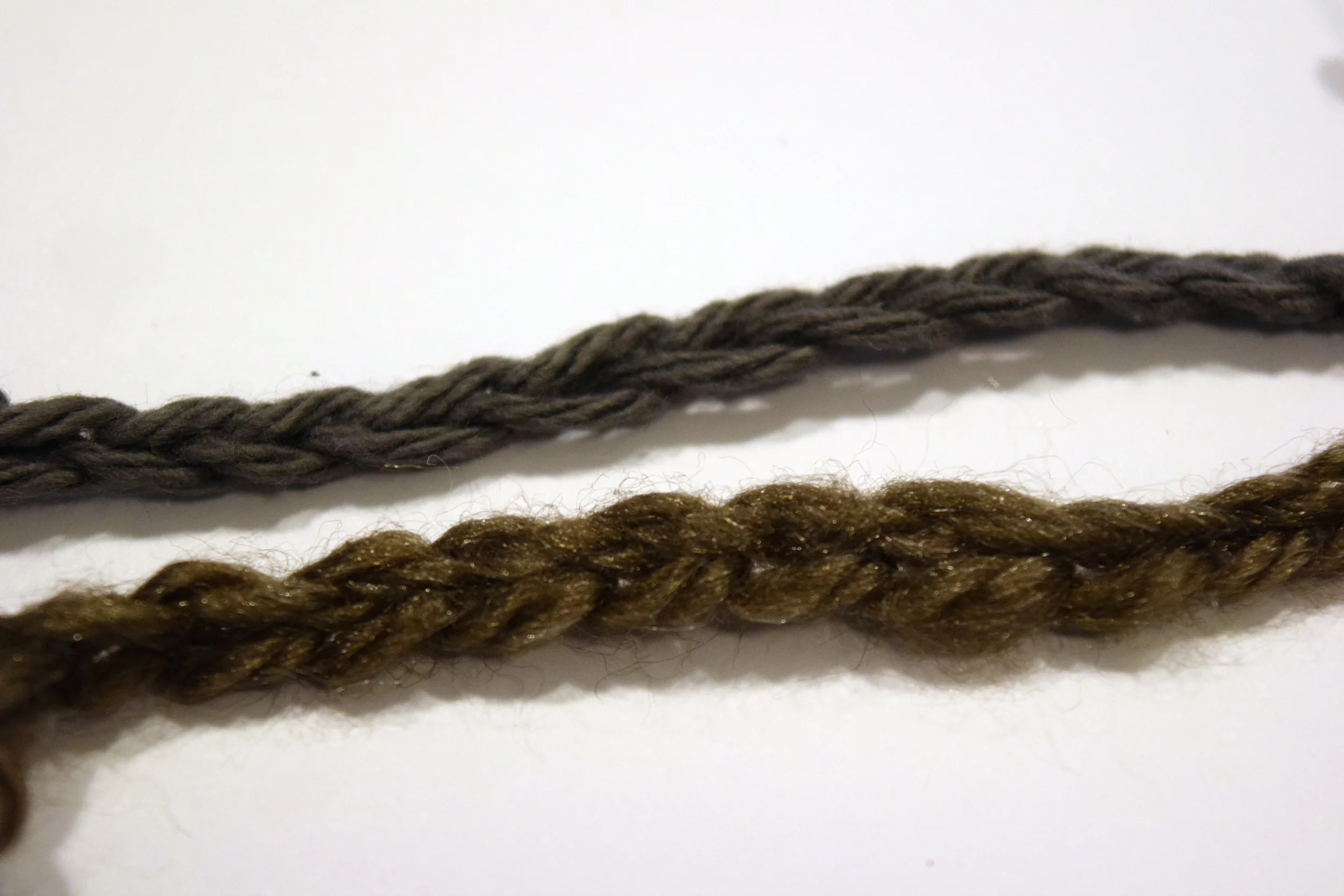 A comparison of chain stitches on the first yarn I bought (below) and the cotton yarn (above). It was MUCH easier to make out the individual stitches in the cotton.