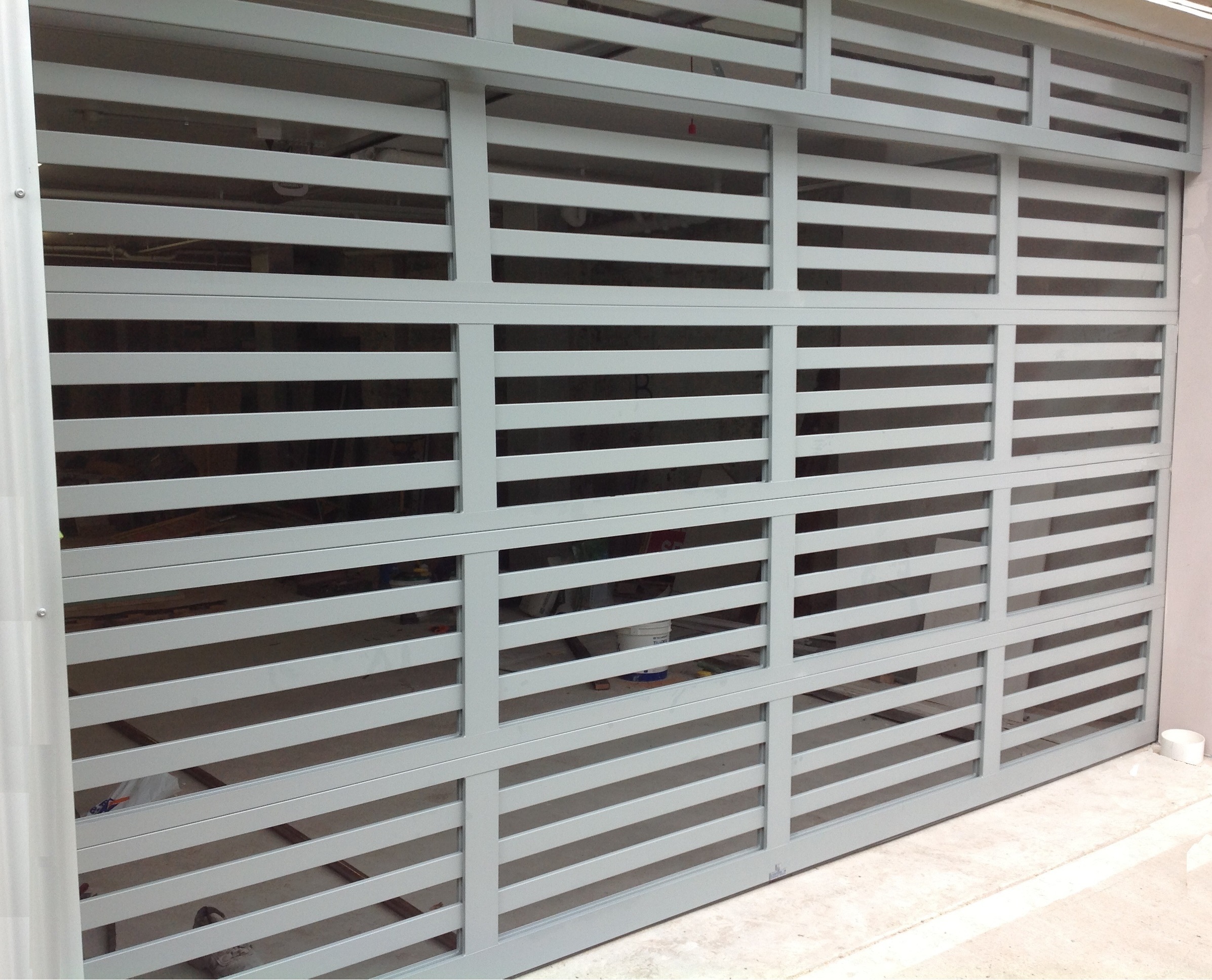 Custom Powder Coated Aluminium Batten Sectional Door (one click on image to enlarge)