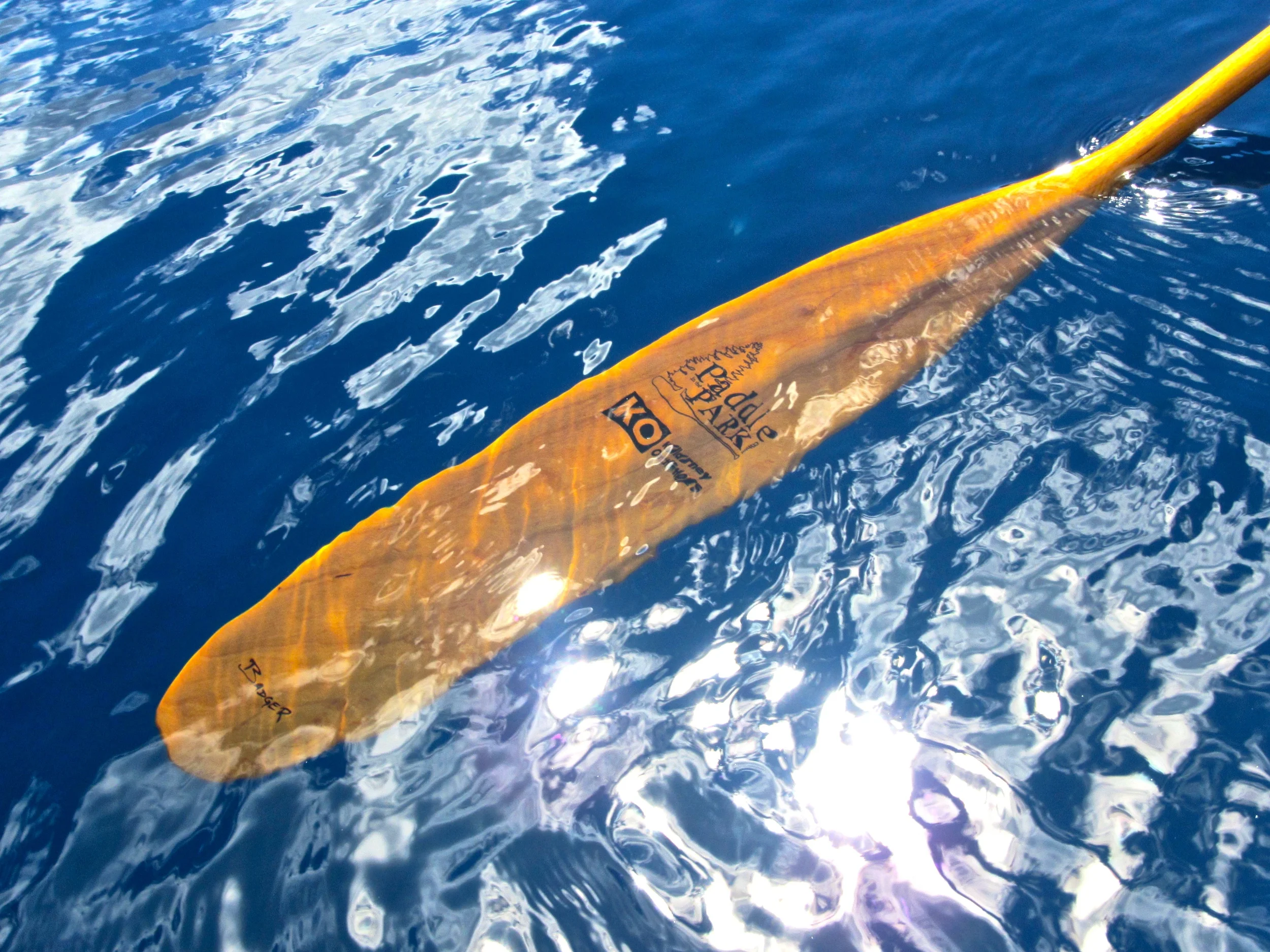 Here's the beautiful prize! A cherry 63" Badger Tripper - and her maiden dip in Nellie Lake, Killarney.