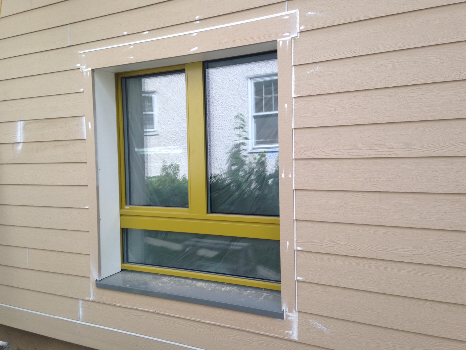  The first finished window.&nbsp; Next step:&nbsp; paint the trim and siding. 