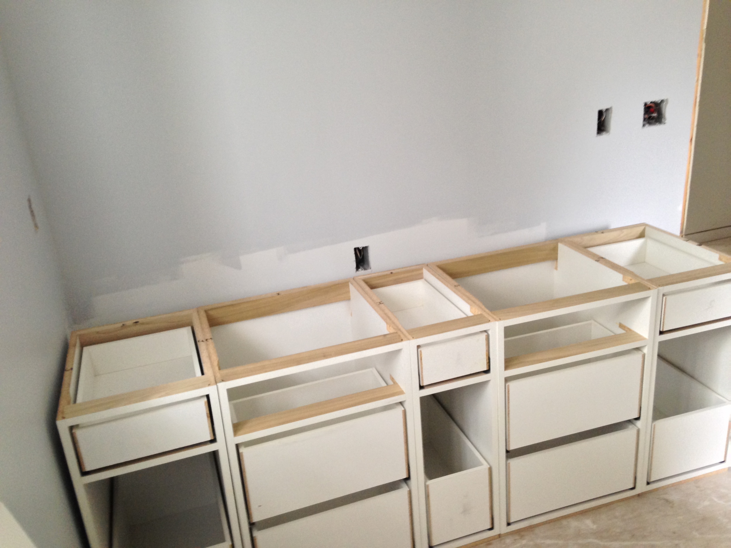  Vanity for the kids' bath, with 2 sinks, 2 pull out hampers and pull out garbage 