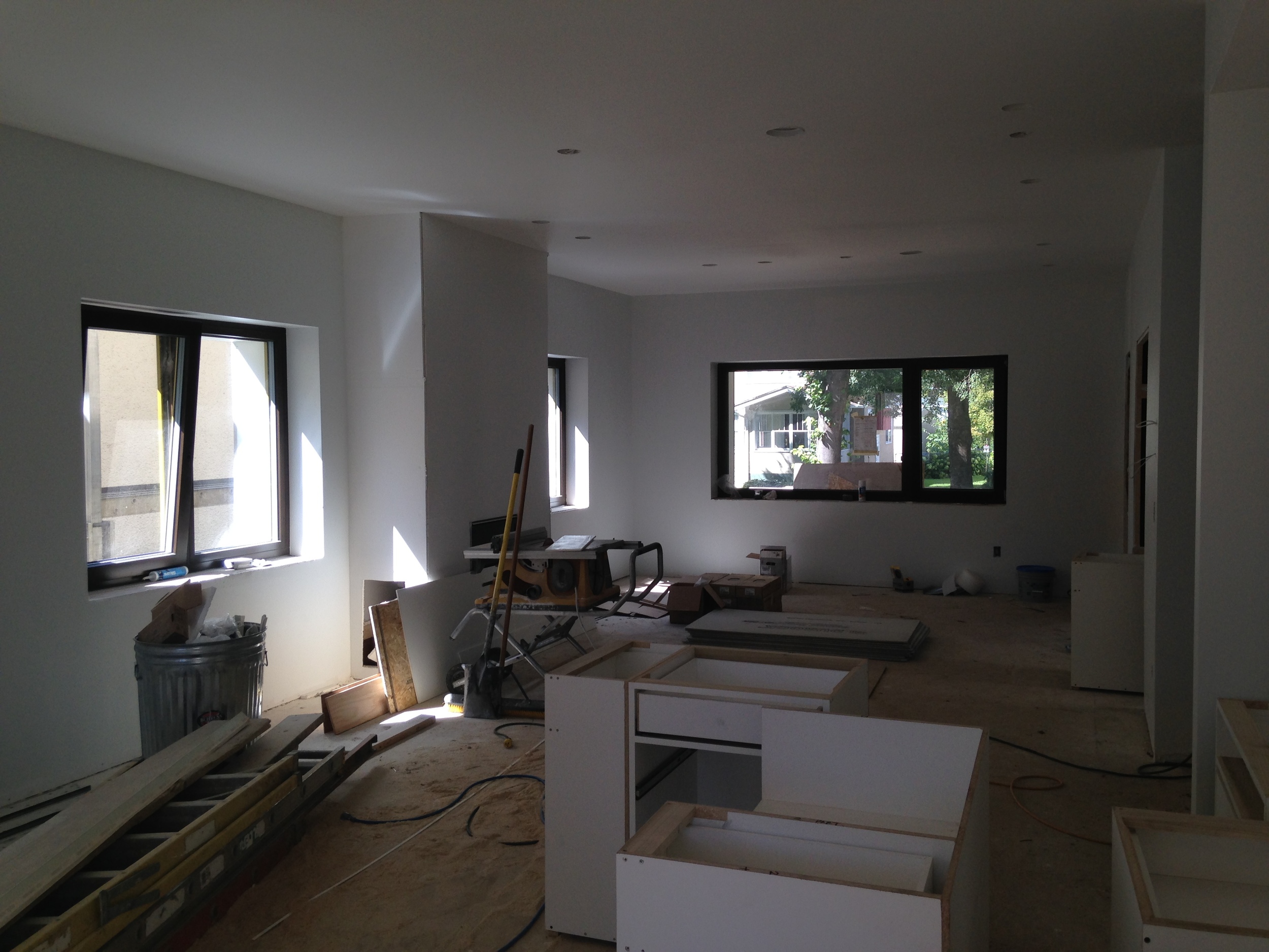  Looking toward the dining and living areas of main room with fireplace 