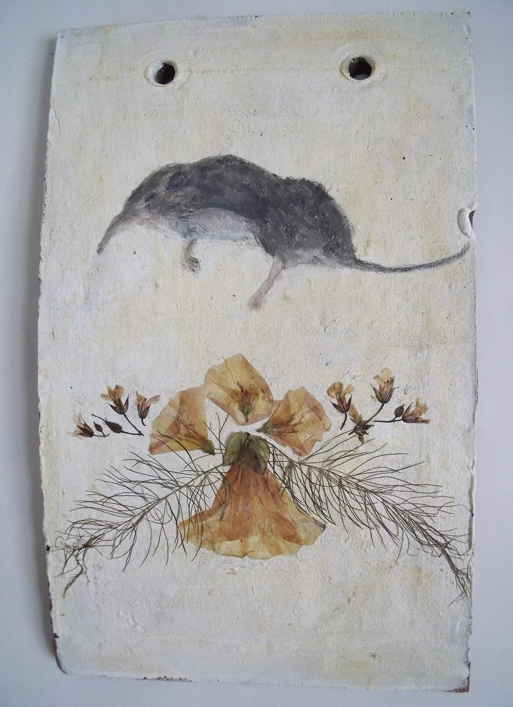 Terracotta tile shrine for a shrew with pressed flowers